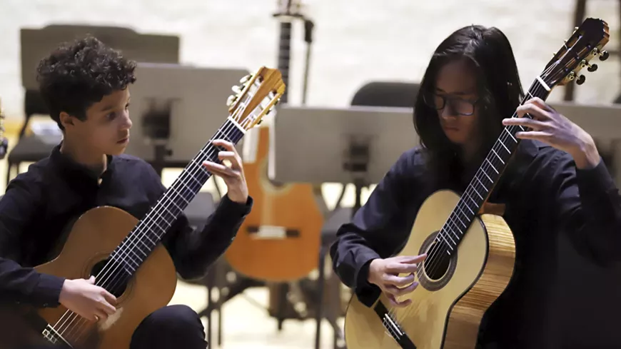 Pima Guitar Ensemble performs a mix of classical and contemporary repertoire on classical guitars.